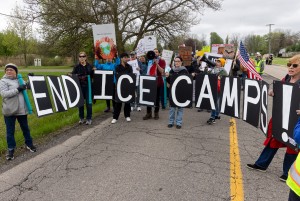 Community Marches to Romulus Camp